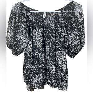 Full tilt, sheer, smocked, black and floral top. Size Small.